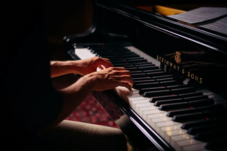 Hands on the Steinway