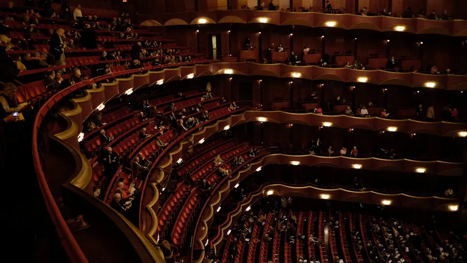 Friday evening — the audience arriving
